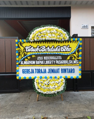 Papan Bunga Duka di Basilam Baru