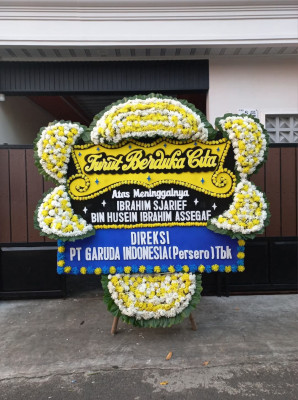 Papan Bunga Duka di Basilam Baru